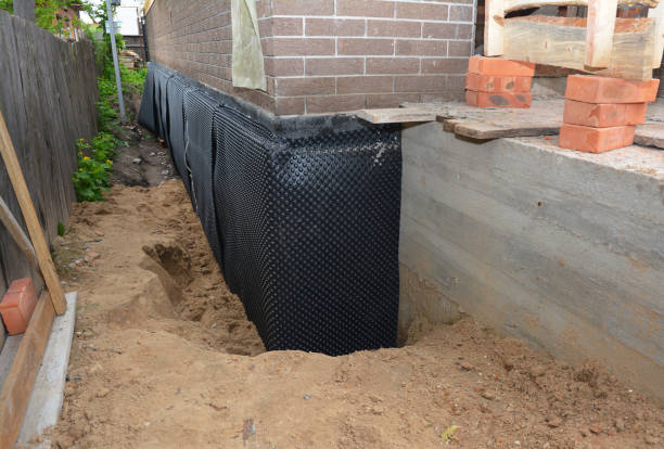 Happy homeowners after waterproofing job in Lodi